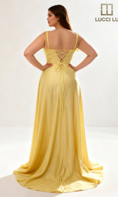 A woman wearing the Lucci Lu 1477 Long Prom Dress, a yellow sleeveless gown with an elegant A-line silhouette and lace-up back, stands facing away from the camera against a plain, well-lit background.