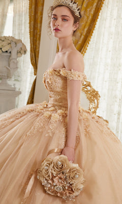 Wearing the Ladivine 15702 Quinceañera Dress with 3-D Flowers, a woman with a tiara and bouquet stands in an elegant room featuring gold curtains and white floral decor.