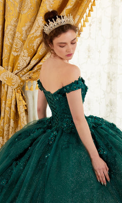 A woman in the Ladivine 15702 Quinceañera Dress with 3-D Flowers and a tiara stands before ornate gold and white curtains, looking over her shoulder.