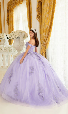 A young woman wearing the Ladivine 15702 Quinceañera Dress with 3-D Flowers and a tiara stands in an ornate room with gold curtains and white floral arrangements.
