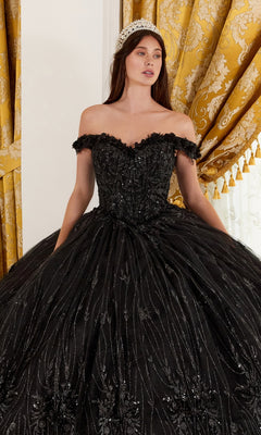 A woman wears the Ladivine 15704 Off-the-Shoulder Quince Ball Gown with intricate beading, standing before gold patterned curtains and sporting a jeweled headpiece.
