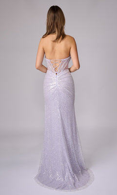 A woman faces away, wearing the Nina Canacci 1603—a light purple, strapless sequin gown with a floor-length skirt and lace-up back detail—perfect for any special occasion.