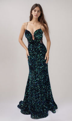 A woman wears the Nina Canacci 1616 Long Formal Dress in Black/Multi with green and blue sequins, a deep neckline, thin straps, and an adjustable lace-up back, standing against a plain background.