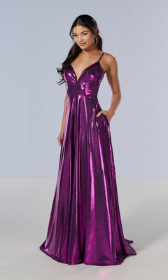 A woman models the Tiffany 16179 long prom dress—a shiny, floor-length purple metallic gown with thin straps and a deep v-neckline—standing against a plain light background.