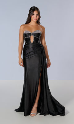 A woman wears the Tiffany 16197 Long Prom Dress—a strapless black gown with a silver embellished bust, cut-out corset bodice, high slit, and draped side detail—standing against a plain background.