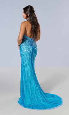 A woman with long brown hair models the Tiffany 16205, a backless, floor-length fitted blue prom dress adorned with sparkling vertical beaded stripes, standing against a plain light background.