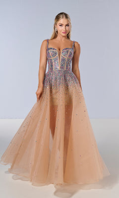 A woman models the Tiffany 16206 long prom dress—a sleeveless, sheer peach tulle gown with a beaded, colorful corset bodice, crystal details, and a deep neckline—posing against a plain light background.