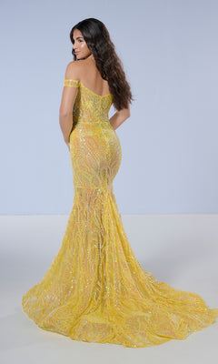 A woman models the Tiffany 16224 long prom dress, featuring an off-the-shoulder fitted mermaid silhouette with yellow sequins, standing with her back to the camera against a plain background.