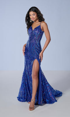 A woman models the Tiffany 16227 long prom dress, featuring sequins, thin straps, an open back, and a thigh-high slit, standing against a plain light background.