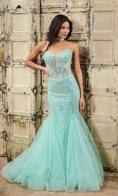 A woman stands before an antique paneled door wearing the Tiffany 16232, a strapless mermaid long prom dress featuring a sweetheart neckline and sequin-embellished tulle skirt.