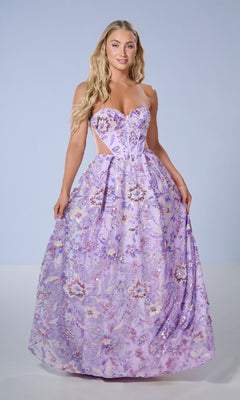 A woman stands against a plain light background wearing the Tiffany 16238 long prom dress—a strapless gown with a sweetheart neckline, cut-out sides, full skirt, and lavender floral patterns.