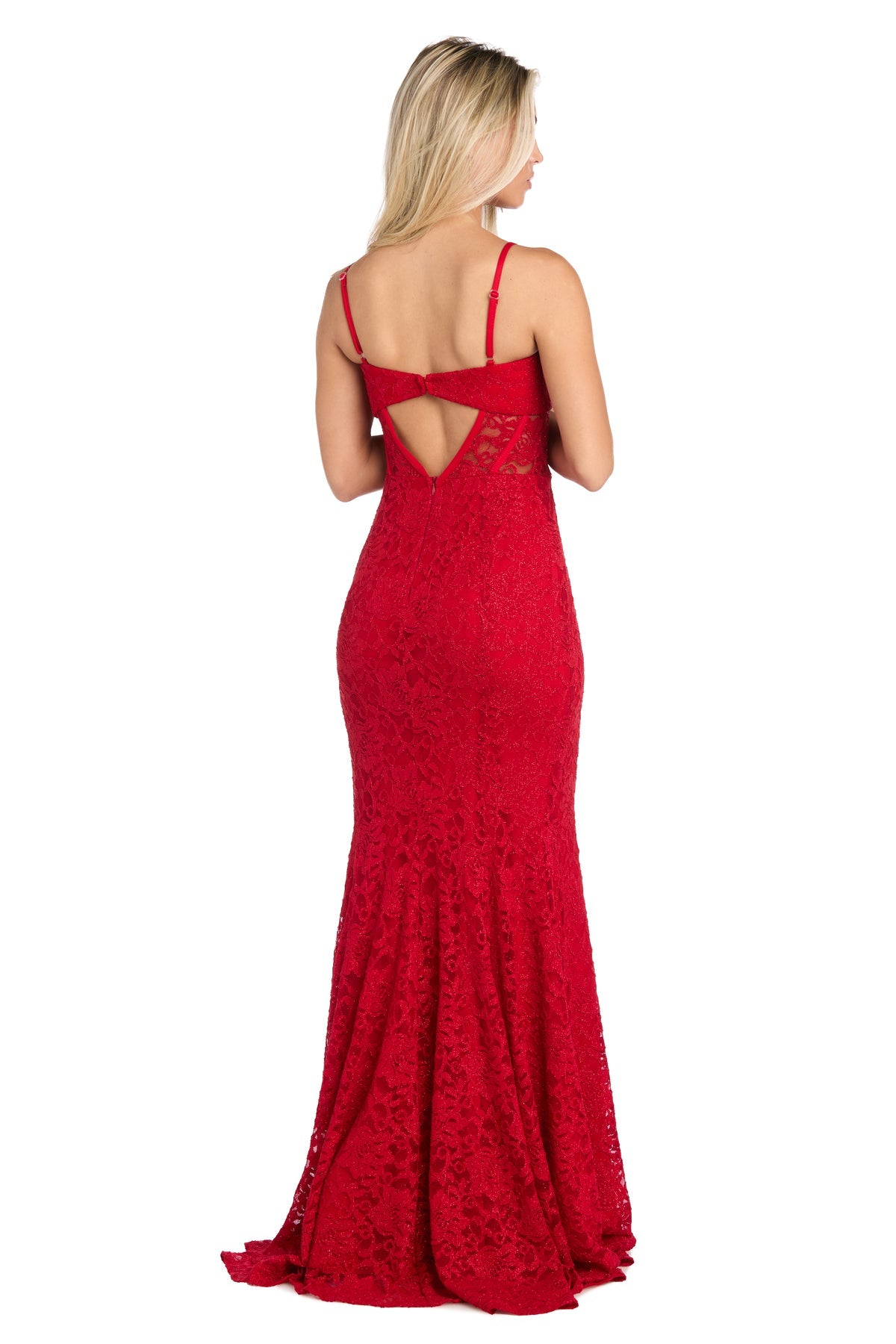 A woman stands with her back to the camera, wearing the Long Red Lace Prom Dress: Morgan 19069, featuring thin straps and a cut-out back detail.