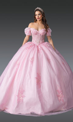 Woman wearing the Quinceanera Dress 1932 By Dancing Queen, featuring pink floral embroidery and a corset bodice, paired with a tiara, poses gracefully against a gray background.