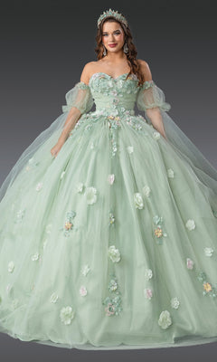 A woman in the Quinceanera Dress 1945 by Dancing Queen, featuring sage green off-shoulder puffy sleeves, 3D flowers, a grand ball gown skirt, and a tiara, stands against a plain gradient background.