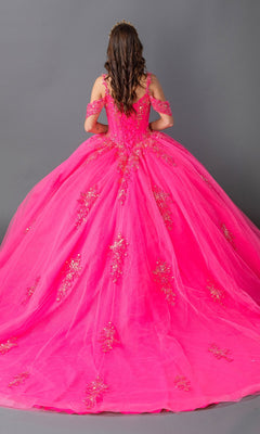 A young woman faces away from the camera in the Hot Pink Quinceanera Dress 1983 By Dancing Queen, featuring gold floral lace embroidery and a corset bodice, set against a gray background.