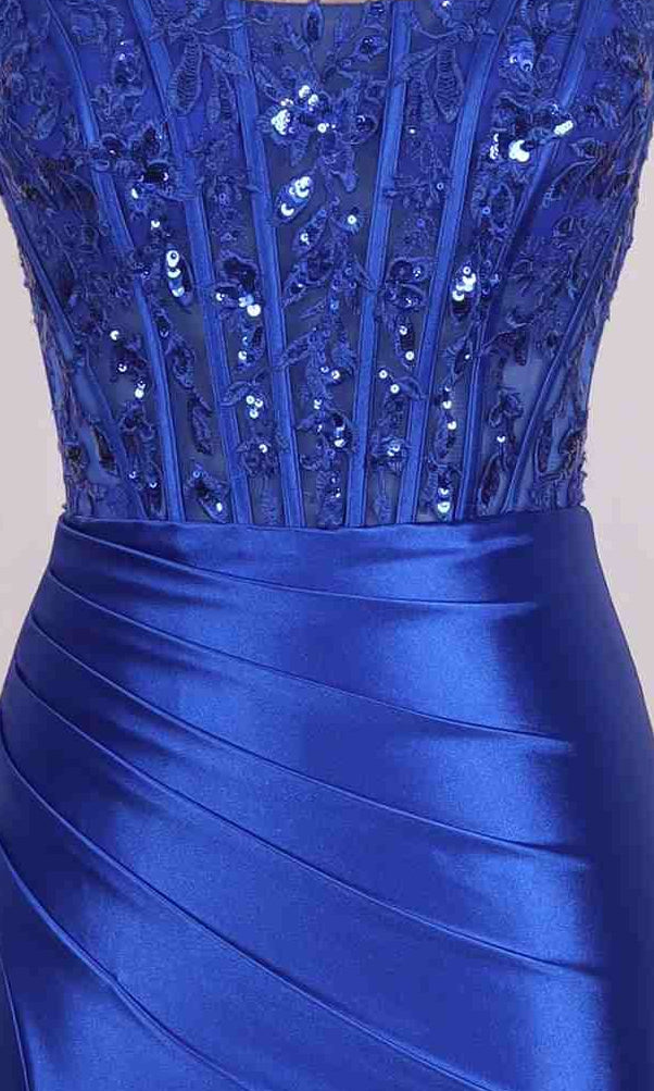 Close-up of the PromGirl Exclusive 250274 long prom dress, showcasing a blue sequin lace corset bodice and a shiny pleated satin skirt.