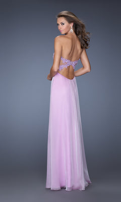 Woman wearing the Strapless Long A-Line Prom Dress: La Femme 20042 in light purple with lace detailing, sweetheart neckline, and open back, standing against a plain gray background.