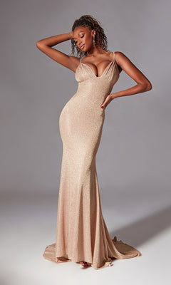 A woman models the Aerie Couture 200 Draped Long Glitter Prom Dress—a champagne-hued, form-fitting, floor-length gown with a deep neckline and thin straps—against a plain gray background.