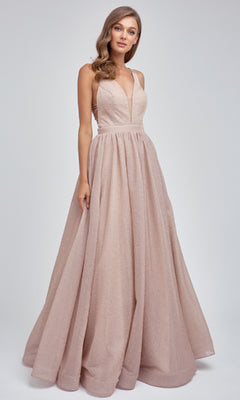Woman wearing the Juliet 201 Long Prom Dress, a floor-length blush pink gown with a sleeveless deep V-neckline and elegant A-line skirt, standing against a plain light background.