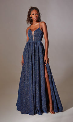 A woman models the Aerie Couture 201 Lace-Up Long Glitter Prom Dress in deep blue, featuring spaghetti straps, a plunging neckline, and a high leg slit—an elegant pick for any formal occasion.
