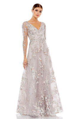Woman wearing the Mac Duggal 20245 Long Violet Lace Formal Dress with floral embroidery, sheer long sleeves, and a V-neck, standing against a plain white background.