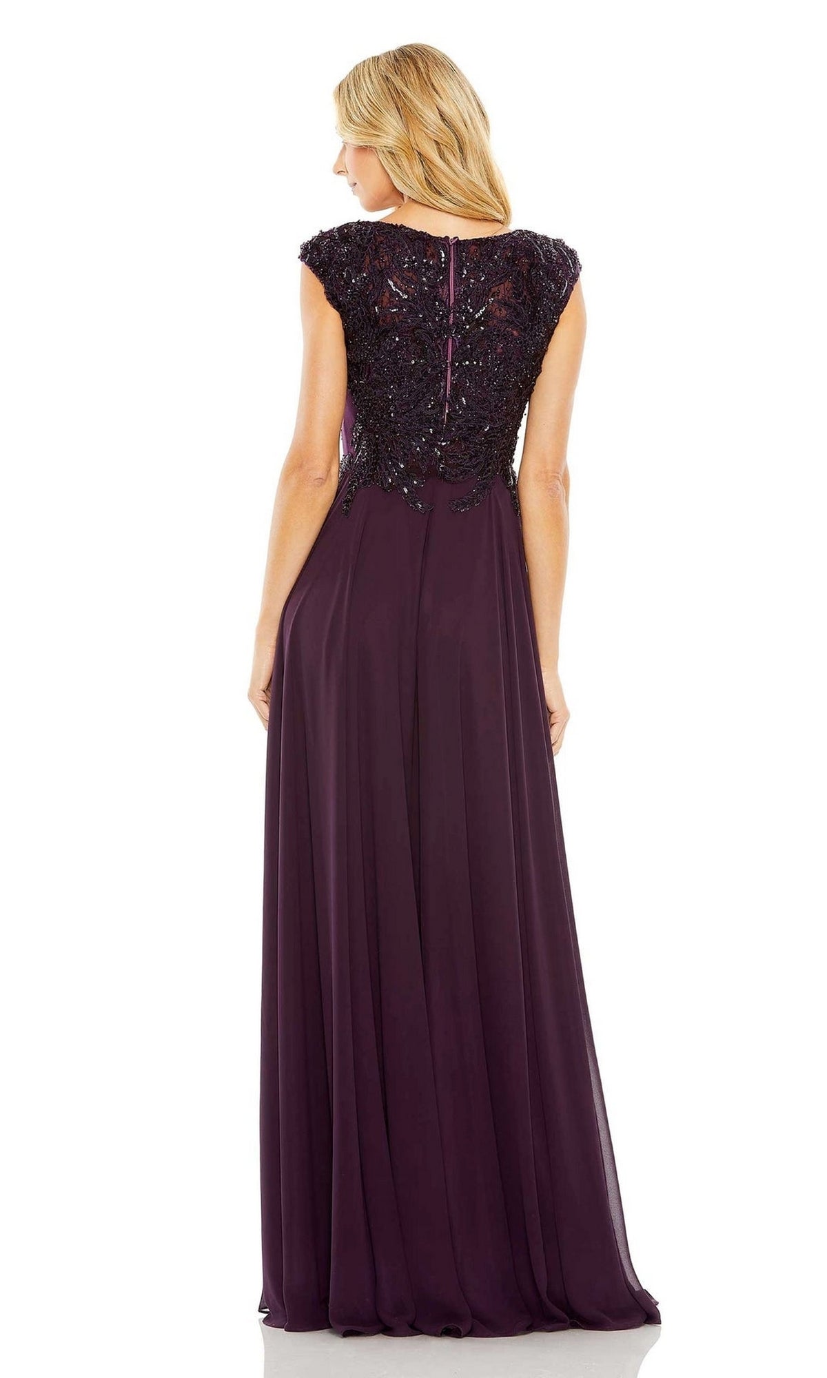 Woman modeling the Mac Duggal 20264 Beaded-Bodice Long Formal Dress—floor-length, sleeveless, with a beaded V-neck bodice and flowing chiffon skirt—in purple, shown from the back.