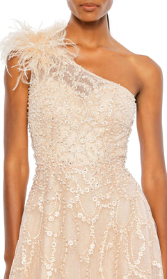 Woman in the Beaded One-Shoulder Prom Gown: Mac Duggal 20389, featuring sequins, a feathered shoulder accent, and elegant sleeveless design—embodying formal evening glamour.