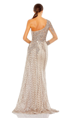 A woman with straight brown hair in a low ponytail models the Mac Duggal 20401 One-Sleeve Long Formal Dress, featuring intricate beadwork, floor-length design, and shown from the back against a white background.