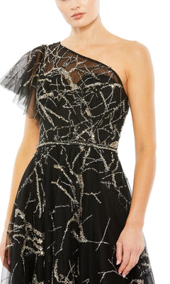 Woman in the Long Formal Dress 20427 by Mac Duggal, a black one-shoulder a-line gown with sheer tulle and silver sequin branch patterns, shown from shoulders to mid-thigh.