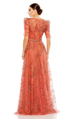 Woman with back to camera in the Long Formal Dress 20428 by Mac Duggal—a floor-length coral A-line gown featuring sheer sleeves, a V-neckline, and metallic embroidered patterns.
