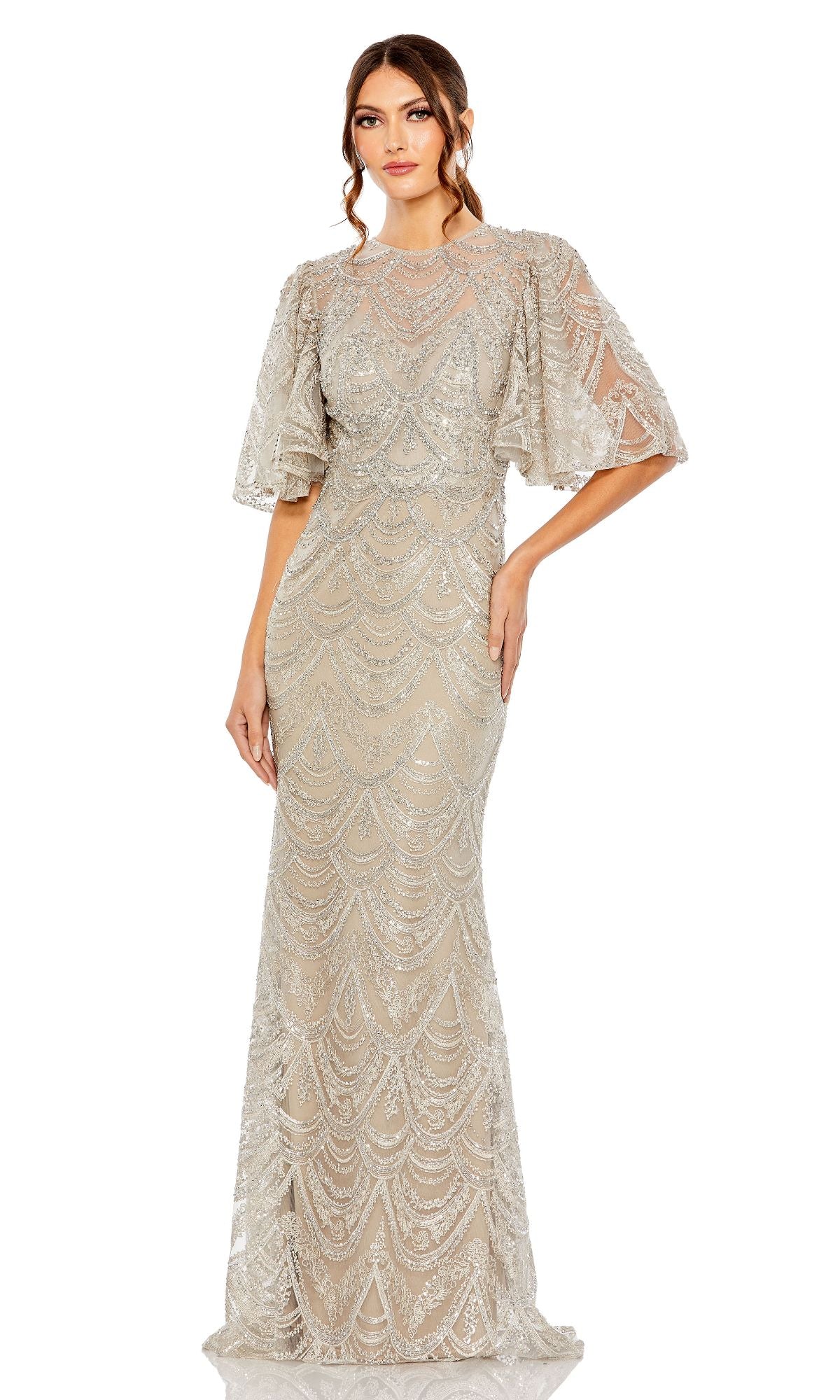 Woman wearing a floor-length, taupe Mac Duggal 20481 formal gown with flutter sleeves, featuring an elegant design, standing against a white background.