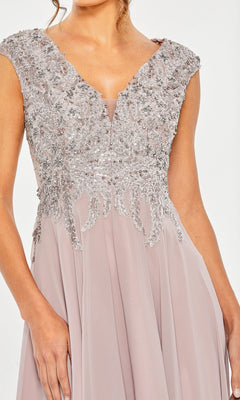 A woman wears the Mac Duggal 20492 Midi Wedding Guest Dress, a sleeveless lavender gown with an embellished v-neck bodice and flowing chiffon skirt.