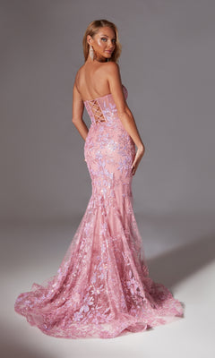 Woman posing in the Sparkly Long Mermaid Prom Dress: Aerie Couture 204—a strapless, floor-length pink gown with floral lace, corset bodice, and lace-up back—against a plain backdrop.