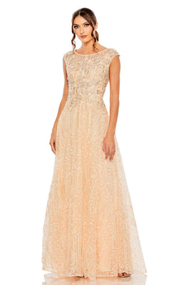 A woman models the Mac Duggal 20501, a floor-length, sleeveless peach formal dress featuring intricate beadwork and a delicate lace overlay, posed against a white background.