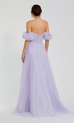 Woman wearing the Mac Duggal 20517 long formal dress—an off-the-shoulder, floor-length pleated tulle evening gown in lavender—seen from the back against a plain light background.