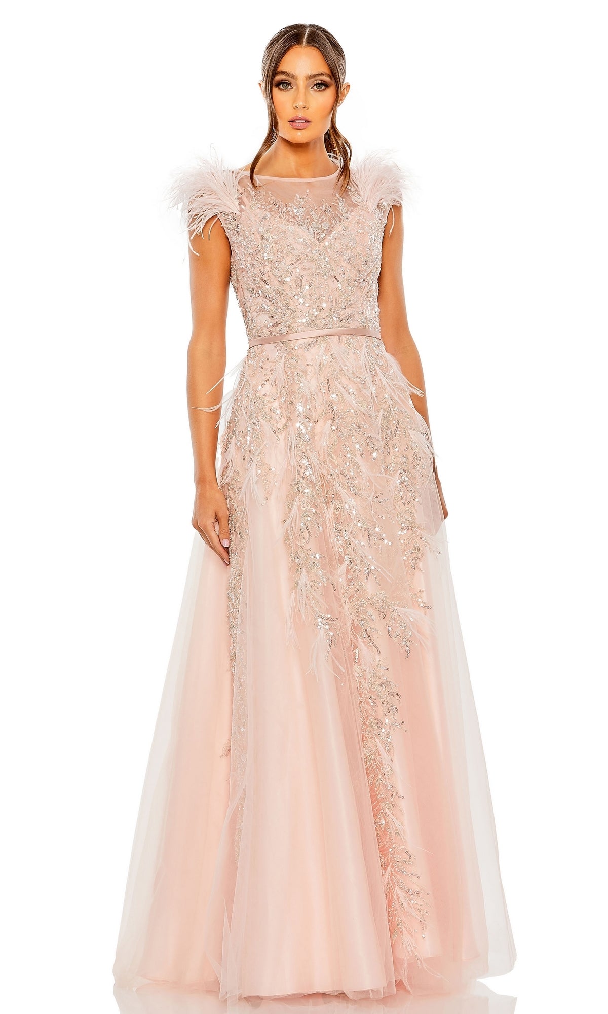 A woman stands facing forward in the Long Formal Dress 20520 by Mac Duggal, a floor-length pastel A-line gown with feather detail, sheer overlay, silver embroidery, elegant embellishments, and graceful shoulder accents.
