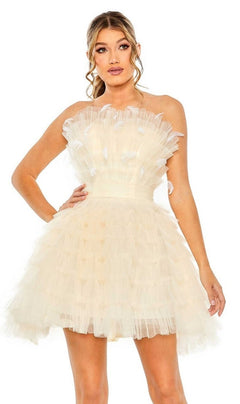 A woman poses with one hand on her hip, wearing the Strapless Ruffle Party Dress: Mac Duggal 20529 in cream, against a plain white background.