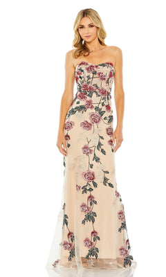 A woman stands against a white background wearing the Long Formal Dress 20581 by Mac Duggal, a strapless, floor-length beige gown with pink and black floral embroidery.