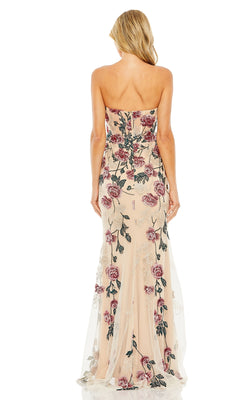 A woman models the Long Formal Dress 20581 by Mac Duggal, a strapless floor-length nude gown with pink floral embroidery and a fitted sweetheart neckline, shown from the back against a white background.