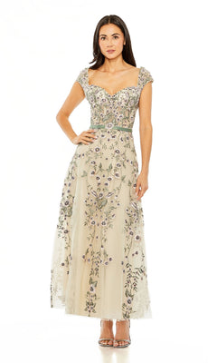 Woman in a Cap-Sleeve Nude Midi Party Dress: Mac Duggal 20582, featuring embroidered floral details, standing against a plain white background with open-toe heels.