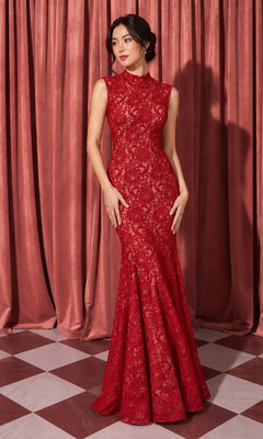 A woman wearing a sleeveless, floor-length burgundy and gold Sleeveless Long Lace Formal Dress: Eureka 2061 with a high neckline, perfect as a vintage formal gown.