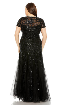 A woman is shown from the back wearing the Long Plus-Size Prom Dress 20623 by Mac Duggal, a floor-length, short-sleeved sequin dress with lace details, perfect for formal occasions.