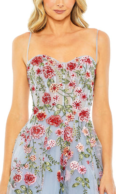 A woman wears the Mac Duggal 20651 Floral Embroidered A-Line Midi Dress, showcasing thin straps and vibrant red, pink, and green floral embroidery—a perfect midi dress for wedding guests.