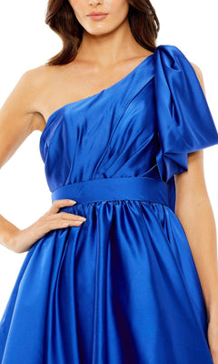 Wearing the Short Cobalt Blue Hoco Dress by Mac Duggal 20690, with a one-shoulder design, fitted waist, and bold bow detail—this chic satin cocktail dress is perfect for your next event.