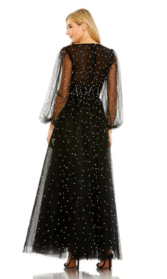 A woman stands elegantly in high heels, seen from the back in the Long Formal Dress 20746 by Mac Duggal—black with white polka dots, puffed sleeves, and a ruched bodice.