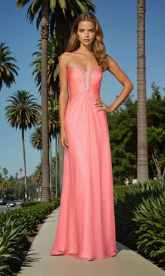 Woman in a pink evening gown standing outdoors with palm trees in the background