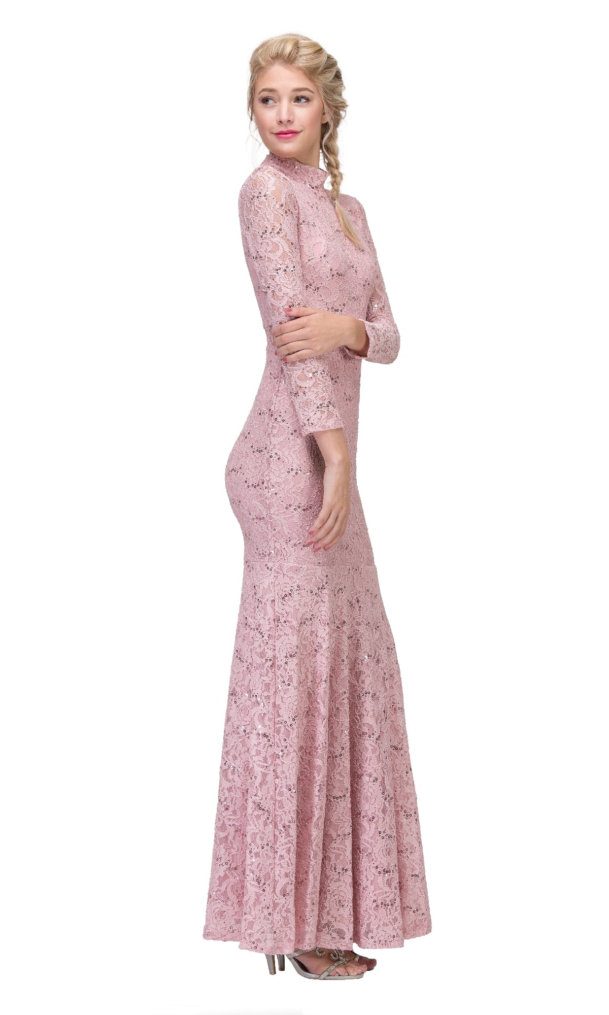 Woman in profile wearing Eureka 2095, a long-sleeve, floor-length pink sequin-lace formal dress with high heels, posed against a white background.