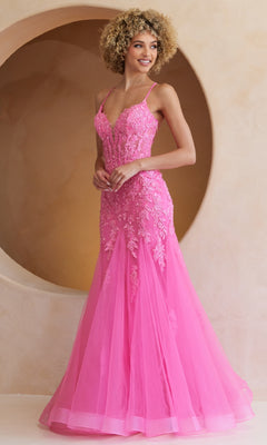 A woman wears the Amelia Couture 2120 Long Mermaid Prom Dress, a bright pink, floor-length gown with embroidered lace details and thin straps, standing before a beige background with a circular cutout.