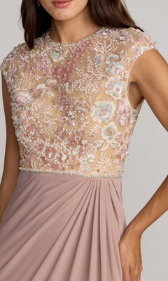 A woman wears the Mac Duggal 21324 long formal dress, featuring a sleeveless mauve design with a sheer, embroidered bodice and a pleated skirt.
