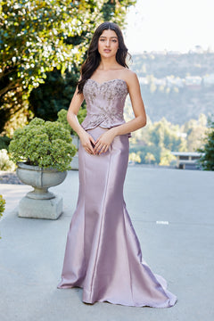 Amelia Couture 2162 strapless mauve floor-length gown featuring a beaded bodice and a peplum waist.